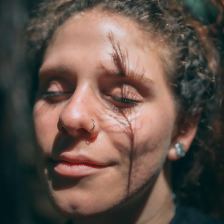 Kaveri Mehta, Lead Design Curator at Virella Tronicus, reviewing corporate floral arrangements